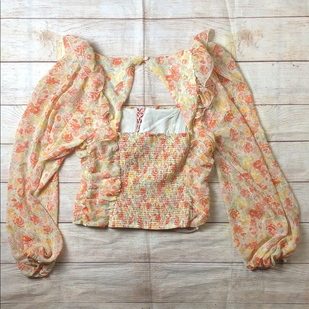 Free People Mabel Fairy Sheet printed ruched‎ blouse with a floral pattern